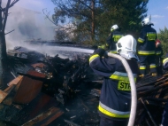 22.05.2014 - Pożar składowiska opału i budynków gospodarczych na ul. Czerskiej w Śliwicach